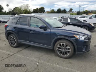 2016 Mazda CX-5 Grand Touring with VIN JM3KE4DY4G0750939, listed as a Copart auction lot 52727395 with 72,428 mi miles and Salvage Title. Bid and sale history available at carsss.com. Image 4.
