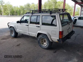 1996 Jeep Cherokee Sport with VIN 1J4FJ68S5TL259449, listed as a IAAI auction lot 42376697 with 72,835 mi miles and . Bid and sale history available at DreamBid. Image 3.