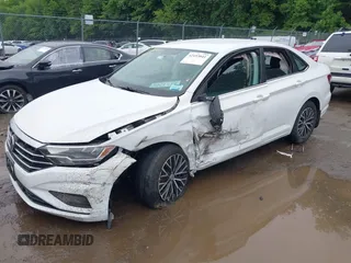 2021 Volkswagen Jetta S z VIN 3VWC57BU9MM103778, wystawiony jako IAAI lot #42493041 z przebiegiem 74 723 mil mil oraz . Historia ofert i sprzedaży dostępna na DreamBid. Obrazek 18.