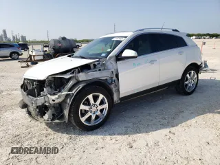 2012 Cadillac SRX Performance Collection z VIN 3GYFNBE3XCS631906, wystawiony jako Copart lot #51152405 z przebiegiem 160 687 mil mil oraz Szkoda całkowita • Salvage title. Historia ofert i sprzedaży dostępna na DreamBid. Obrazek 1.