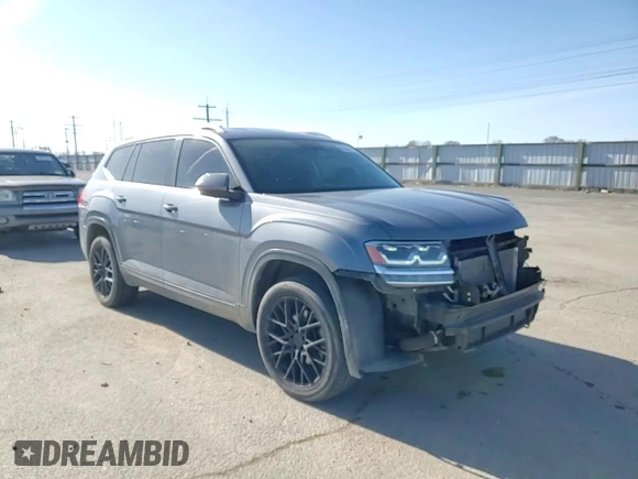 2018 Volkswagen Atlas SE z VIN 1V2CP2CA2JC596042, wystawiony jako Copart lot #49864425 z przebiegiem 87 859 mil mil oraz Szkoda całkowita • Salvage title. Historia ofert i sprzedaży dostępna na DreamBid. Obrazek 12.