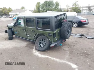 2024 Jeep Wrangler Willys z VIN 1C4RJXN64RW163089, wystawiony jako IAAI lot #41145274 z przebiegiem 31 869 mil mil oraz . Historia ofert i sprzedaży dostępna na DreamBid. Obrazek 3.
