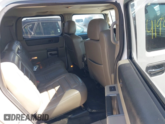 2003 Hummer H2 z VIN 5GRGN23U83H120658, wystawiony jako IAAI lot #41992183 z przebiegiem 226 207 mil mil oraz . Historia ofert i sprzedaży dostępna na DreamBid. Obrazek 8.