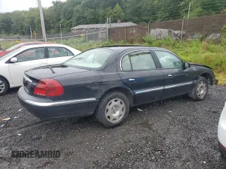 2002 Lincoln Continental with VIN 1LNHM97VX2Y664075, listed as a Copart auction lot 73747234 with 0 mi miles and Clean Title. Bid and sale history available at carsss.com. Image 3.