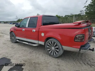 2003 Ford F-150 XLT with VIN 1FTRW07643KB48614, listed as a Copart auction lot 51895905 with 157,290 mi miles and Salvage Title. Bid and sale history available at carsss.com. Image 2.