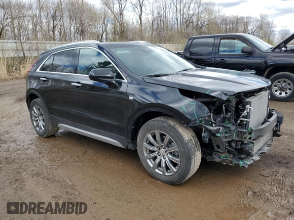 2020 Cadillac XT4 AWD Premium Luxury with VIN 1GYFZDR44LF051848, listed as a Copart auction lot 53104295 with 23,339 mi miles and Salvage Title. Bid and sale history available at DreamBid. Image 4.