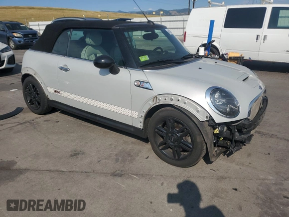 2012 MINI Convertible S z VIN WMWZP3C51CT296464, wystawiony jako Copart lot #64290005 z przebiegiem 107 580 mil mil oraz Szkoda całkowita • Salvage title. Historia ofert i sprzedaży dostępna na DreamBid. Obrazek 4.