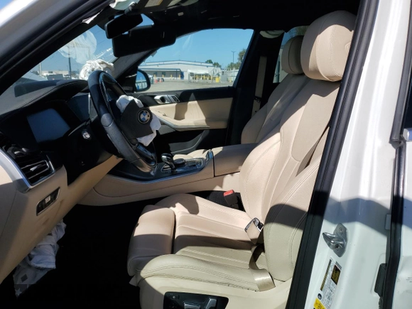 2020 BMW X5 xDrive40i with VIN 5UXCR6C02L9C46986, listed as a Copart auction lot 49099615 with Not provided miles and Salvage title. Bid and sale history available at DreamBid. Image 7.