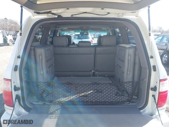 2005 Lexus LX 470 with VIN JTJHT00W653551986, listed as a IAAI auction lot 41575221 with 166,287 mi miles. Bid and sale history available at carsss.com. Image 8.