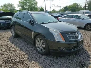 2011 Cadillac SRX Premium Collection z VIN 3GYFNFEY9BS606335, wystawiony jako Copart lot #59009285 z przebiegiem 152 828 mil mil oraz Szkoda całkowita • Salvage title. Historia ofert i sprzedaży dostępna na DreamBid. Obrazek 14.