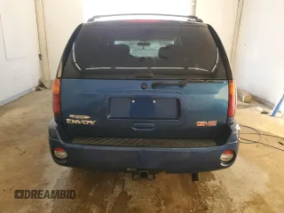 2005 GMC Envoy SLT with VIN 1GKDS13S652339845, listed as a Copart auction lot 77693684 with 220,306 mi miles and Salvage Title. Bid and sale history available at carsss.com. Image 6.