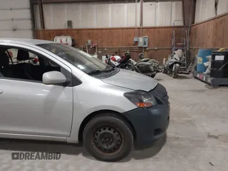 2008 Toyota Yaris with VIN JTDBT903781251568, listed as a IAAI auction lot 42090260 with 264,356 mi miles. Bid and sale history available at carsss.com. Image 12.