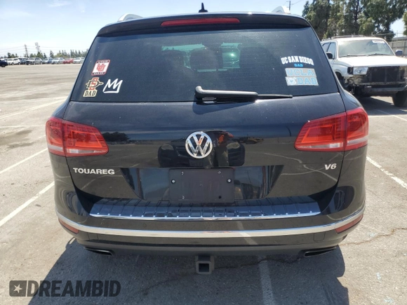 2016 Volkswagen Touareg Sport with VIN WVGEF9BP0GD007399, listed as a Copart auction lot 53990675 with 110,439 mi miles and Salvage Title. Bid and sale history available at DreamBid. Image 6.