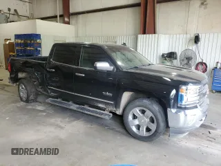 2017 Chevrolet Silverado 1500 LTZ with VIN 3GCPCSEC9HG339738, listed as a Copart auction lot 53599595 with 220,488 mi miles and Salvage Title. Bid and sale history available at DreamBid. Image 4.