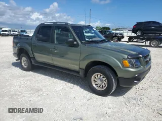 2001 Ford Explorer Sport Trac with VIN 1FMZU67E51UA99453, listed as a Copart auction lot 77953554 with 148,217 mi miles and Clean title. Bid and sale history available at DreamBid. Image 4.