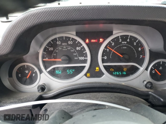 2008 Jeep Wrangler Sahara with VIN 1J4FA54148L561961, listed as a Copart auction lot 50770895 with 126,516 mi miles and Salvage title. Bid and sale history available at DreamBid. Image 9.