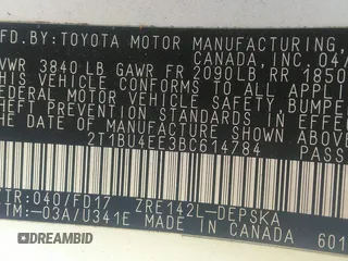 2011 Toyota Corolla L with VIN 2T1BU4EE3BC614784, listed as a IAAI auction lot 42024386 with 210,901 mi miles. Bid and sale history available at carsss.com. Image 9.