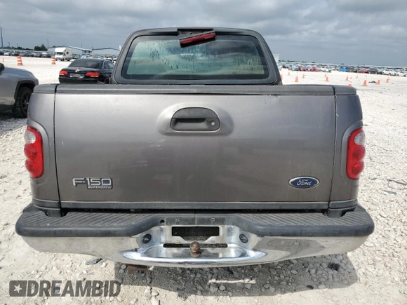 2002 Ford F-150 XLT with VIN 1FTRW07L42KE06960, listed as a Copart auction lot 53909835 with Not Provided miles and Salvage Title. Bid and sale history available at DreamBid. Image 6.