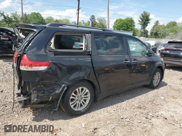 2011 Toyota Sienna XLE AAS with VIN 5TDYK3DC8BS019513, listed as a Copart auction lot 54671575 with 149,633 mi miles and Salvage Title. Bid and sale history available at DreamBid. Image 3.