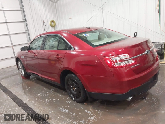2013 Ford Taurus Limited with VIN 1FAHP2F82DG140741, listed as a IAAI auction lot 41882262 with 131,017 mi miles. Bid and sale history available at carsss.com. Image 3.