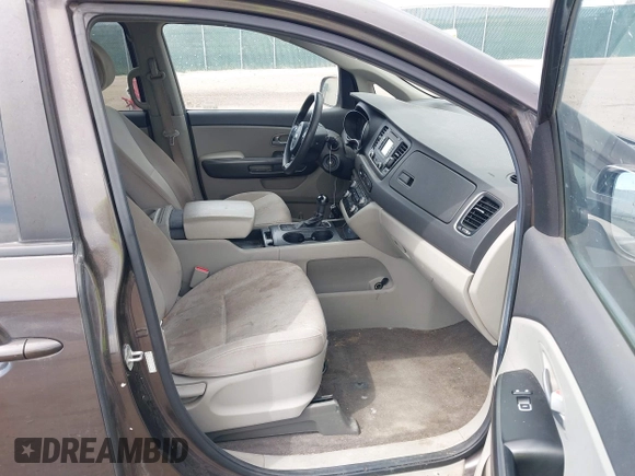 2015 Kia Sedona LX with VIN KNDMB5C13F6072586, listed as a IAAI auction lot 42090232 with 125,818 mi miles. Bid and sale history available at carsss.com. Image 5.
