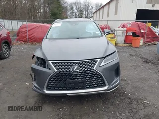 2021 Lexus RX with VIN 2T2HZMDA4MC259360, listed as a IAAI auction lot 41820519 with 57,747 mi miles. Bid and sale history available at carsss.com. Image 13.