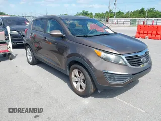 2012 Kia Sportage LX with VIN KNDPB3A20C7266396, listed as a IAAI auction lot 42292971 with 103,891 mi miles and . Bid and sale history available at DreamBid. Image 1.