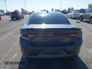 2019 Dodge Charger R/T z VIN 2C3CDXCT7KH527732, wystawiony jako IAAI lot #42283453 z przebiegiem 99 755 mil mil oraz . Historia ofert i sprzedaży dostępna na DreamBid. Obrazek 17.