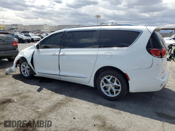 2017 Chrysler Pacifica Touring L Plus with VIN 2C4RC1EGXHR518841, listed as a Copart auction lot 54969455 with 130,902 mi miles and Clean Title. Bid and sale history available at DreamBid. Image 2.