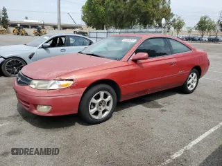 1999 Toyota Solara SE z VIN 2T1CF22P9XC181570, wystawiony jako Copart lot #62398955 z przebiegiem 268 663 mil mil oraz Czysty tytuł • Clean title. Historia ofert i sprzedaży dostępna na DreamBid. Obrazek 1.