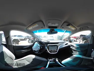 2017 Chevrolet Bolt EV LT z VIN 1G1FW6S02H4171516, wystawiony jako IAAI lot #42004692 z przebiegiem Nie podano mil oraz . Historia ofert i sprzedaży dostępna na DreamBid. Obrazek 18.