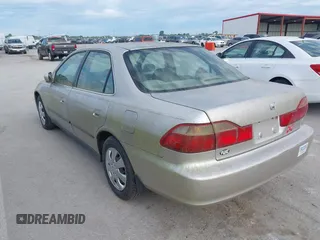 1999 Honda Accord LX with VIN JHMCG5642XC003361, listed as a IAAI auction lot 42270009 with 160,706 mi miles and . Bid and sale history available at DreamBid. Image 3.