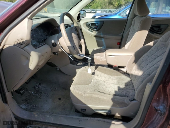 2001 Chevrolet Malibu LS with VIN 1G1NE52J016153947, listed as a Copart auction lot 73813784 with 129,336 mi miles and Salvage Title. Bid and sale history available at carsss.com. Image 7.