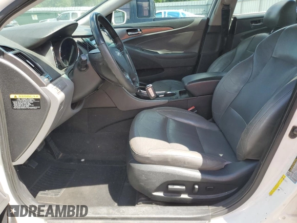 2012 Hyundai Sonata Hybrid z VIN KMHEC4A43CA059186, wystawiony jako Copart lot #55575405 z przebiegiem 217 801 mil mil oraz Szkoda całkowita • Salvage title. Historia ofert i sprzedaży dostępna na DreamBid. Obrazek 7.