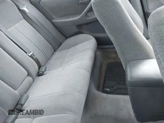 2000 Toyota Camry CE z VIN 4T1BG22KXYU948498, wystawiony jako IAAI lot #42247074 z przebiegiem 152 973 mil mil oraz . Historia ofert i sprzedaży dostępna na DreamBid. Obrazek 8.