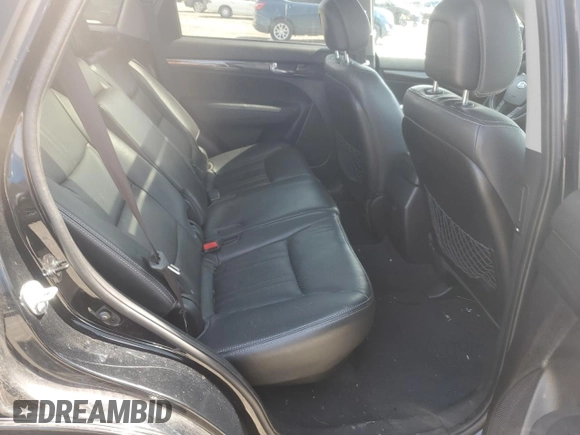 2012 Kia Sorento SX z VIN 5XYKW4A28CG193611, wystawiony jako Copart lot #57659935 z przebiegiem 203 349 mil mil oraz Szkoda całkowita • Salvage title. Historia ofert i sprzedaży dostępna na DreamBid. Obrazek 10.