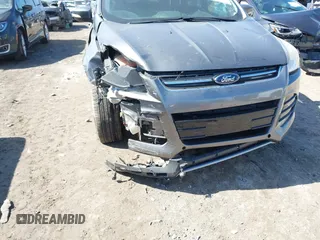 2013 Ford Escape SEL with VIN 1FMCU9H98DUB89046, listed as a IAAI auction lot 41794795 with 89,819 mi miles and . Bid and sale history available at DreamBid. Image 6.