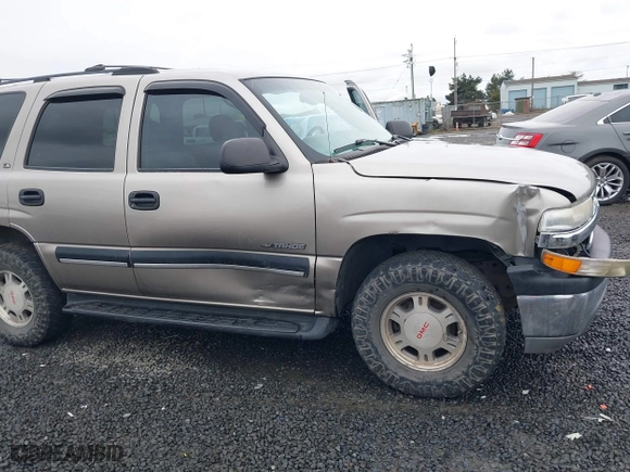 2001 Chevrolet Tahoe LS with VIN 1GNEK13T11R109826, listed as a IAAI auction lot 41473357 with 257,335 mi miles. Bid and sale history available at carsss.com. Image 6.