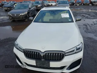 2021 BMW 5 Series M550i xDrive z VIN WBA13BK09MCF05866, wystawiony jako IAAI lot #41574859 z przebiegiem 37 822 mil mil oraz . Historia ofert i sprzedaży dostępna na DreamBid. Obrazek 6.