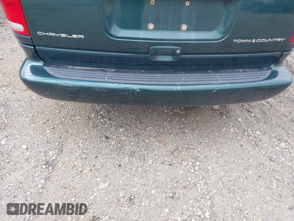1999 Chrysler Town & Country with VIN 1C4GP54G6XB603564, listed as a IAAI auction lot 41823340 with 104,321 mi miles and . Bid and sale history available at DreamBid. Image 17.