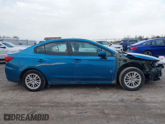 2018 Subaru Impreza Premium z VIN 4S3GKAB61J3600395, wystawiony jako IAAI lot #41816178 z przebiegiem 133 606 mil mil oraz . Historia ofert i sprzedaży dostępna na DreamBid. Obrazek 14.