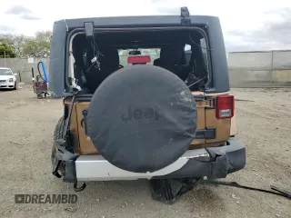 2015 Jeep Wrangler Unlimited Sahara z VIN 1C4BJWEG5FL645846, wystawiony jako Copart lot #53326855 z przebiegiem 122 510 mil mil oraz Szkoda całkowita • Salvage title. Historia ofert i sprzedaży dostępna na DreamBid. Obrazek 6.