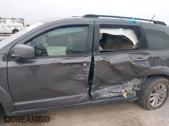 2015 Dodge Journey SXT with VIN 3C4PDCBG2FT649308, listed as a IAAI auction lot 42285409 with 140,668 mi miles and . Bid and sale history available at DreamBid. Image 6.