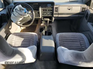 1994 Jeep Grand Cherokee Laredo with VIN 1J4FX58S1RC334178, listed as a Copart auction lot 75943554 with 165,435 mi miles and Clean Title. Bid and sale history available at carsss.com. Image 8.