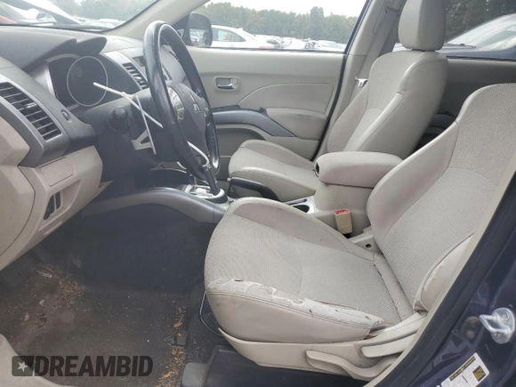 2009 Mitsubishi Outlander SE with VIN JA4MT31W89Z001770, listed as a Copart auction lot 70411544 with 161,549 mi miles and Salvage title. Bid and sale history available at DreamBid. Image 7.