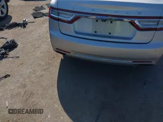2018 Lincoln Continental Premiere z VIN 1LN6L9PK5J5603376, wystawiony jako IAAI lot #41880976 z przebiegiem Nie podano mil oraz . Historia ofert i sprzedaży dostępna na DreamBid. Obrazek 15.