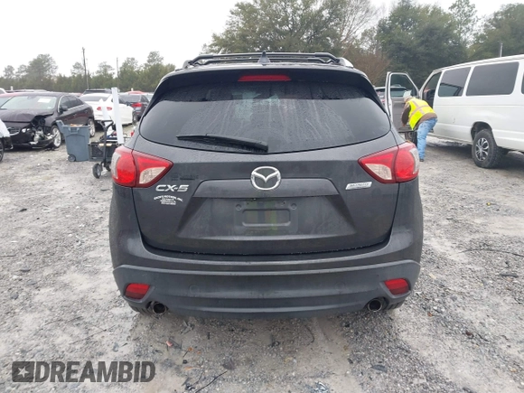 2015 Mazda CX-5 Touring with VIN JM3KE2CY4F0435563, listed as a IAAI auction lot 41311988 with 187,183 mi miles. Bid and sale history available at carsss.com. Image 16.