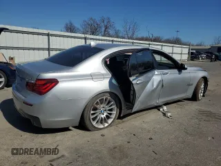 2013 BMW 7 Series 750Li xDrive с VIN WBAYF8C5XDD141001, выставлен на аукционе Copart как лот 48727635 с пробегом 131 462 миль миль и Списание • Salvage title. История ставок и продаж доступна на DreamBid. Изображение 3.