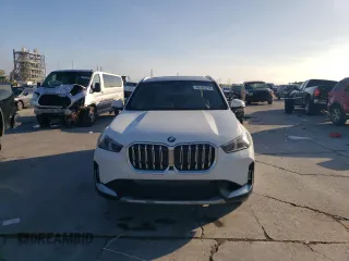 2025 BMW X1 xDrive28i with VIN WBX73EF08S5034108, listed as a Copart auction lot 49151215 with 5,043 mi miles and Salvage Title. Bid and sale history available at carsss.com. Image 5.