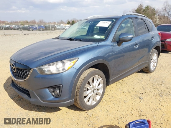 2015 Mazda CX-5 Grand Touring with VIN JM3KE4DY5F0469098, listed as a IAAI auction lot 41858792 with 174,883 mi miles. Bid and sale history available at carsss.com. Image 18.
